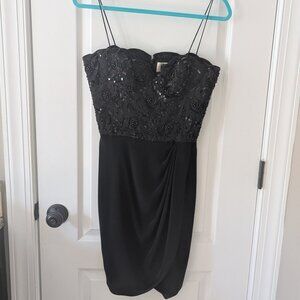 Black vintage 'Nite line' dress.